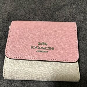 Pink and cream coach wallet. Great condition and no issues